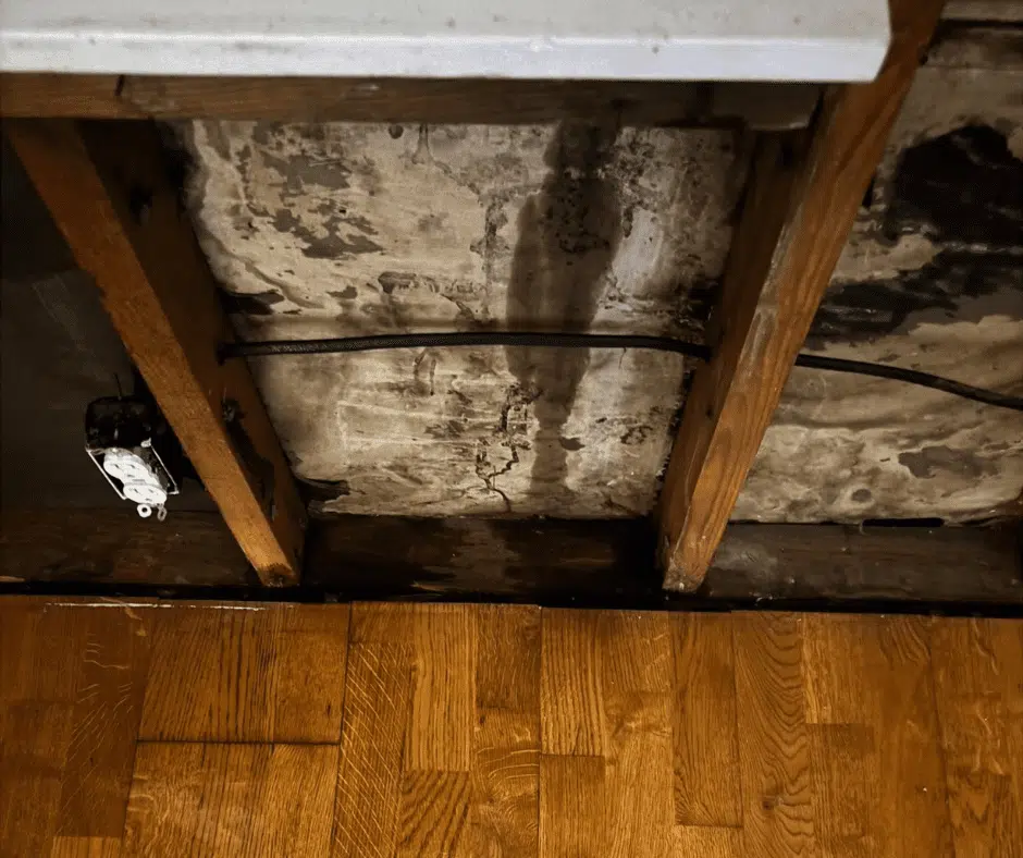 Older home with hidden structural gaps allowing moisture intrusion during storms.