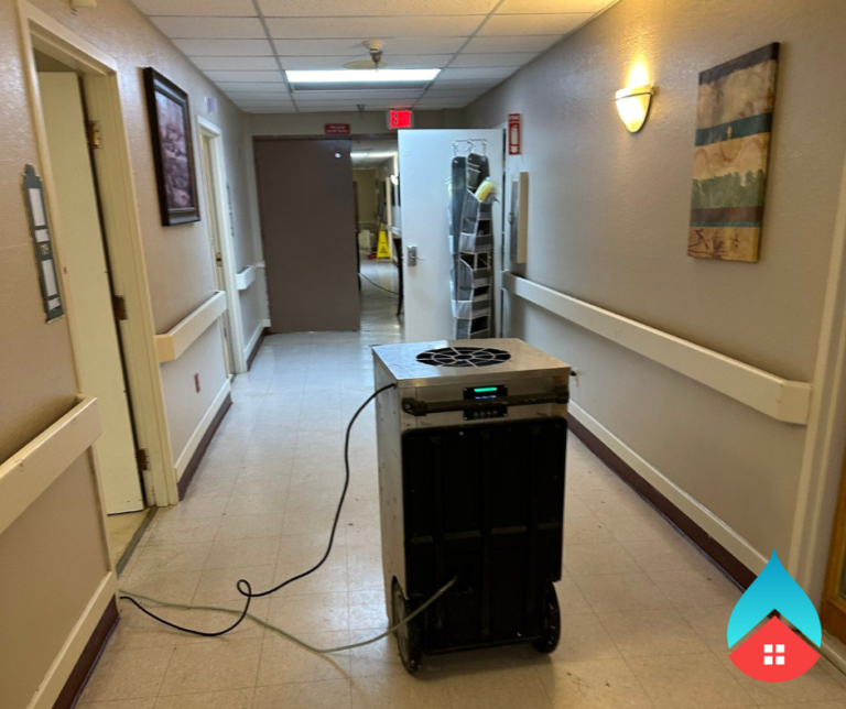 - Smoke odor removal equipment operating in fire‑damaged living space - Professional deodorization process removing smoke particles from indoor air If you want these tailored to a specific photo, just upload it and I’ll match the alt text precisely.