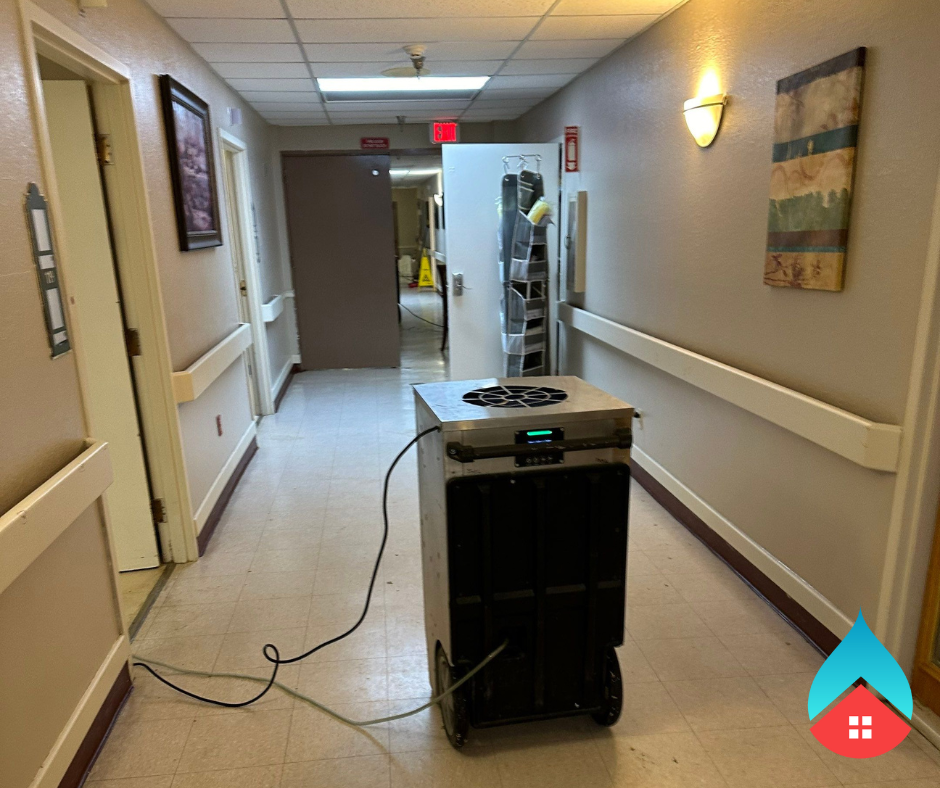 - Smoke odor removal equipment operating in fire‑damaged living space - Professional deodorization process removing smoke particles from indoor air If you want these tailored to a specific photo, just upload it and I’ll match the alt text precisely.