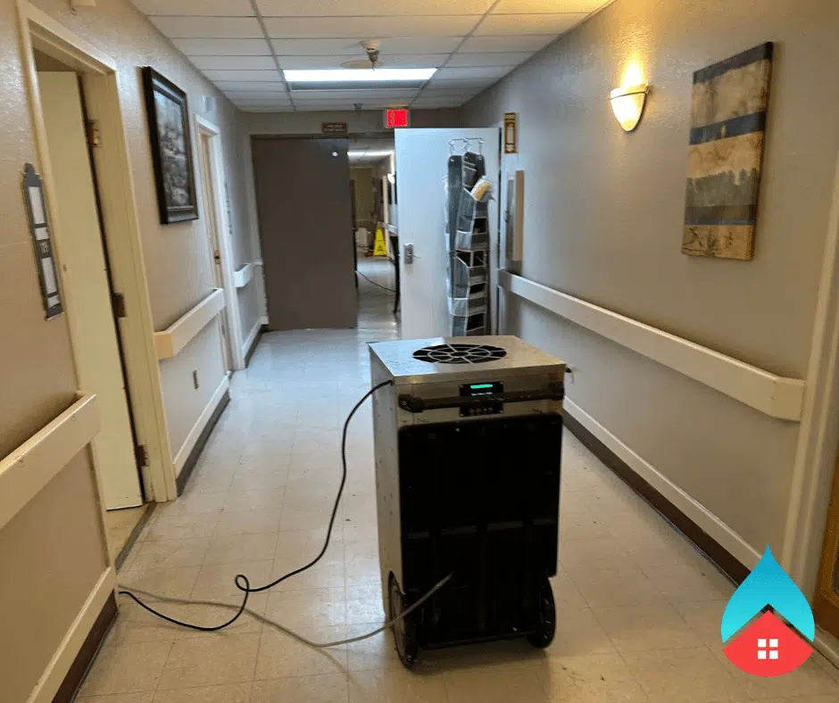 Smoke odor removal equipment operating in fire‑damaged living space - Professional deodorization process removing smoke particles from indoor air If you want these tailored to a specific photo, just upload it and I’ll match the alt text precisely.