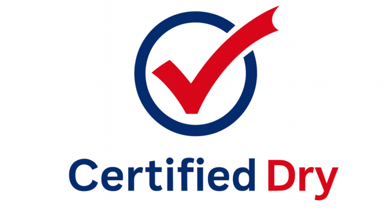 Water extraction equipment removing standing water from a flooded room