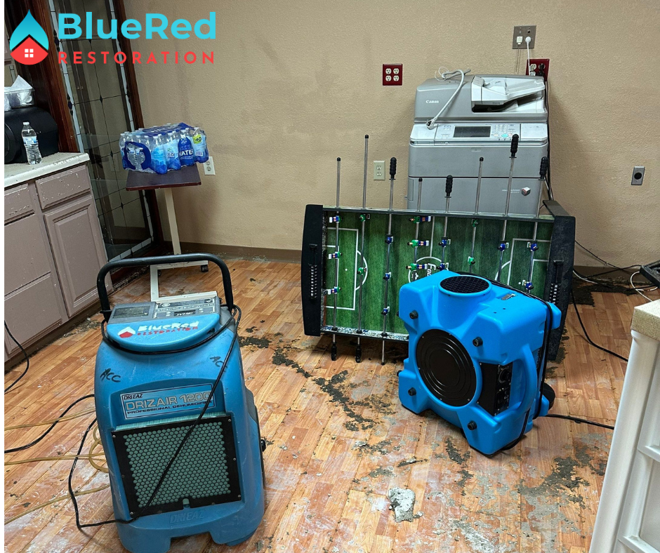 Commercial building undergoing storm cleanup and water removal in South Bend.