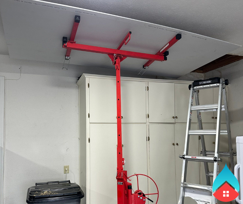 Technician explaining water damage prevention steps and moisture control solutions to a homeowner.